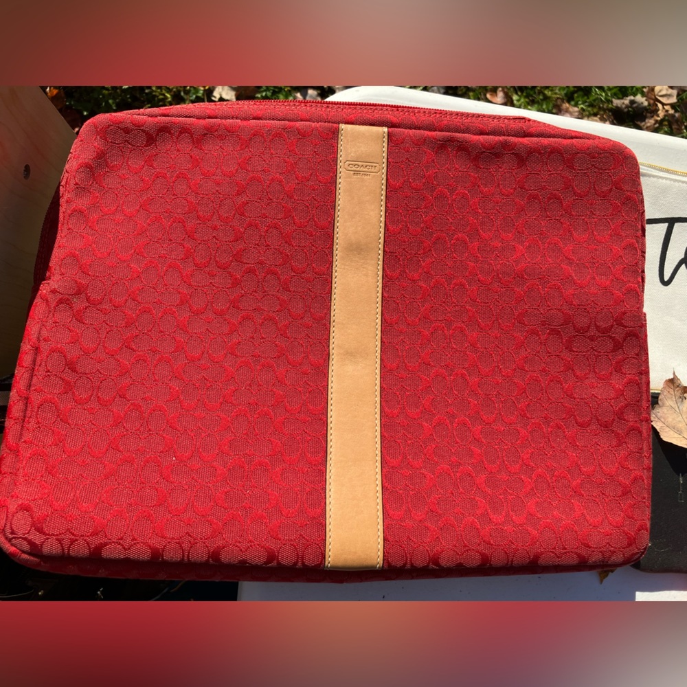 Coach lap top bag fits smaller laptops